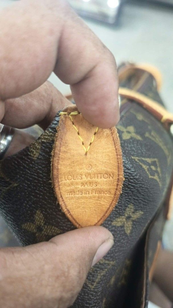 Louis Vuitton Monogram Canvas Tote Bag (Category: Luxury Bags & Wallets) located in Manila. Submitted by youngbear.185ac4 (Listing ID 1468304226, Image 3). Description: - Classic Monogram canvas with brown leather trim - Secure zippered top closure and convenient front slip pockets - Dual top handles and brown fabric interior lining - Made in France - Condition: Shows normal wear on corners and leather straps.