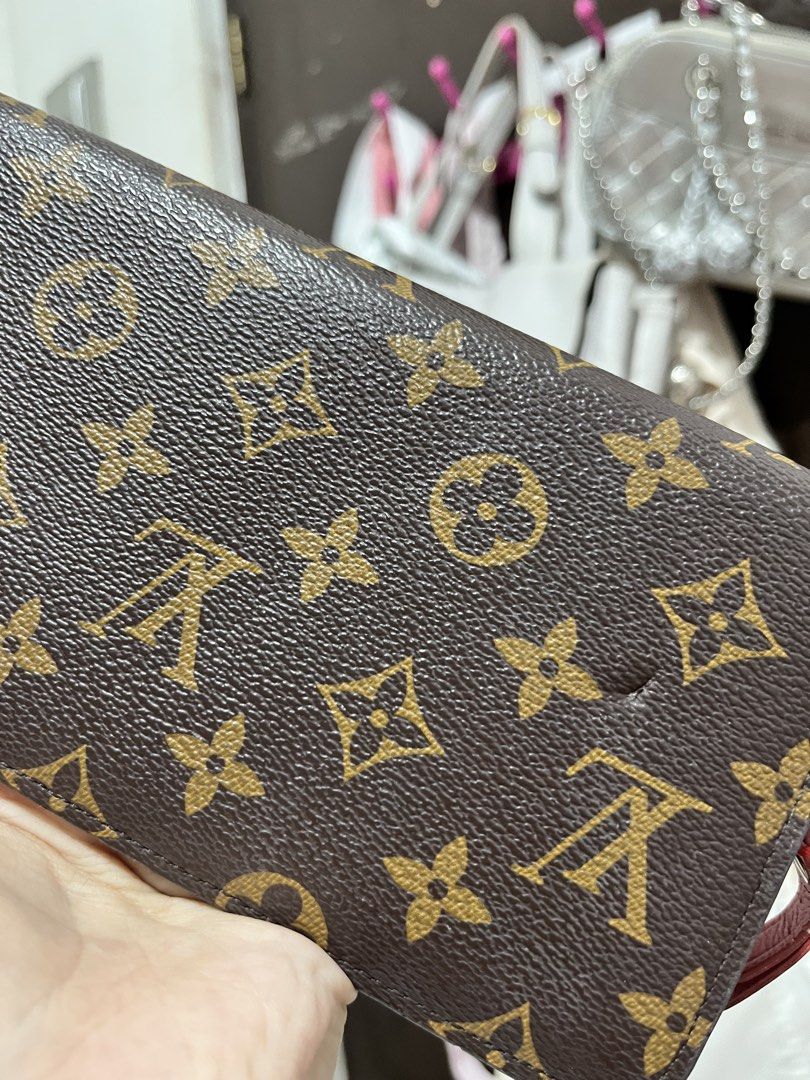 Louis Vuitton Monogram Canvas Long Zip Wallet Red Interior (Category: Luxury Bags & Wallets) located in Manila. Submitted by alygnoida (Listing ID 1468354410, Image 2). Description: - Brand: Louis Vuitton - Material: Monogram canvas with bright red leather lining - Closure: Secure all-around zipper with gold-tone hardware and charm - Interior: Multiple card slots, zipper coin pocket, and spacious main compartments - Condition: Interior shows gent