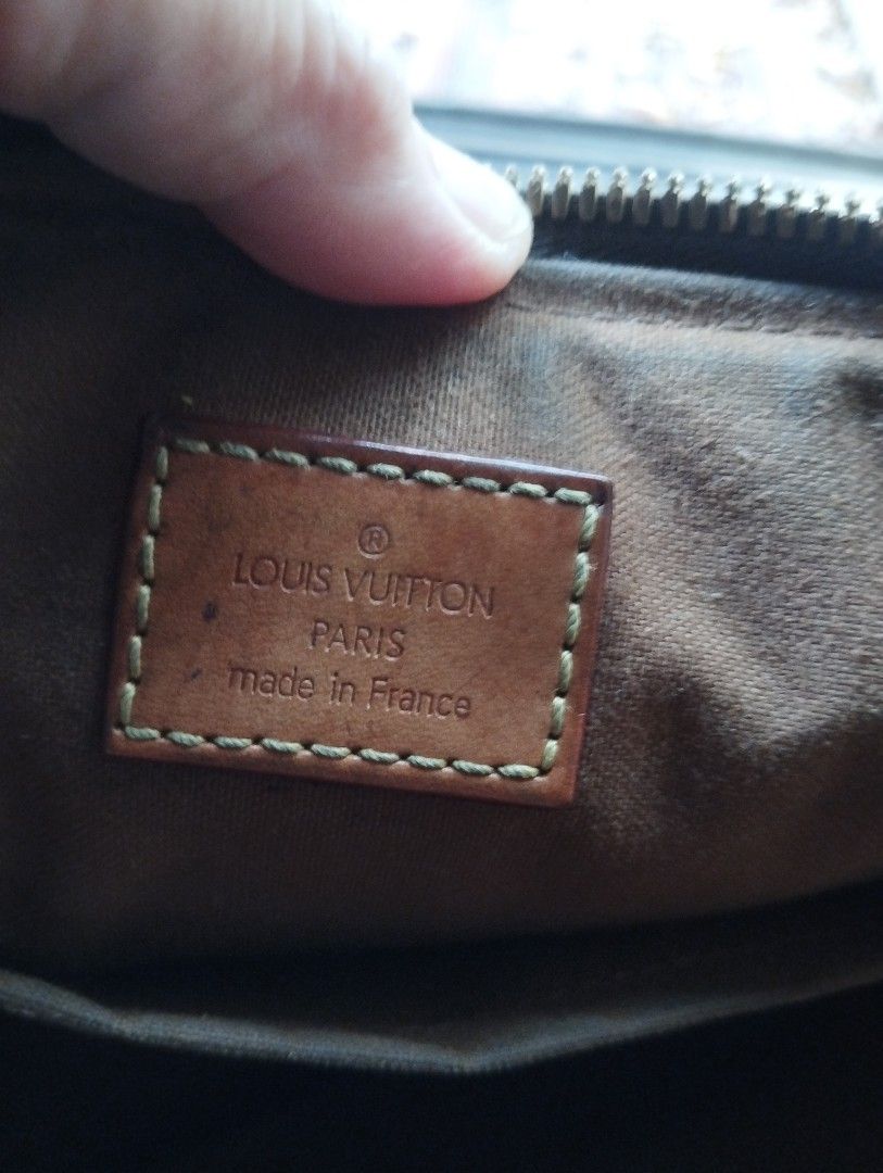 Louis Vuitton Monogram Canvas Tote Handbag (Category: Tote Bags) located in Manila. Submitted by lene48 (Listing ID 1468392667, Image 3). Description: - Louis Vuitton Monogram Canvas Tote - Color: Classic brown with tan leather piping and handles - Stylish Upgrade: Leather handles elegantly wrapped in patterned twill scarves - Closure: Secure gold-tone zipper across the top - Interior: Brown fabric lining with Louis Vuitton Paris made in France l