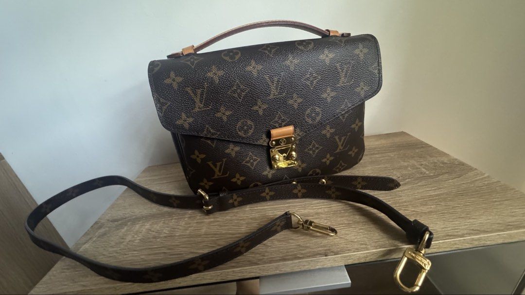 Louis Vuitton Monogram Pochette Metis Handbag (Category: Luxury Bags & Wallets) located in Plaridel. Submitted by kathtrene_alonzo39 (Listing ID 1468287191, Image 3). Description: - Brand: Louis Vuitton - Model: Monogram Pochette Métis - Material: Classic brown monogram canvas with natural cowhide leather top handle - Hardware: Gold-tone with signature S-lock closure - Strap: Removable and adjustable monogram shoulder/crossbody strap - Interior: 