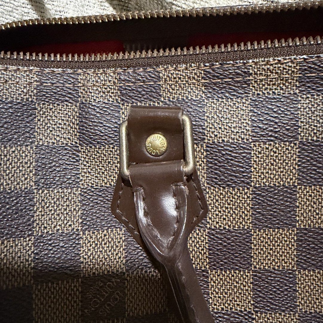Louis Vuitton Speedy 30 Damier Ebene (Category: Luxury Bags & Wallets) located in Dasmarinas. Submitted by cosmic.miggy (Listing ID 1468443235, Image 3). Description: 📌 Item Details: Brand: Louis Vuitton Model: Speedy 30 Pattern / Material: Damier Ebene Coated Canvas with Dark Brown Leather Trim Hardware: Brass / Gold-tone Interior: Red Canvas Lining Date Code: DU1048 (Made in France - 14th week of 2008) 📦 Inclusions: Original Louis Vuitton Dus
