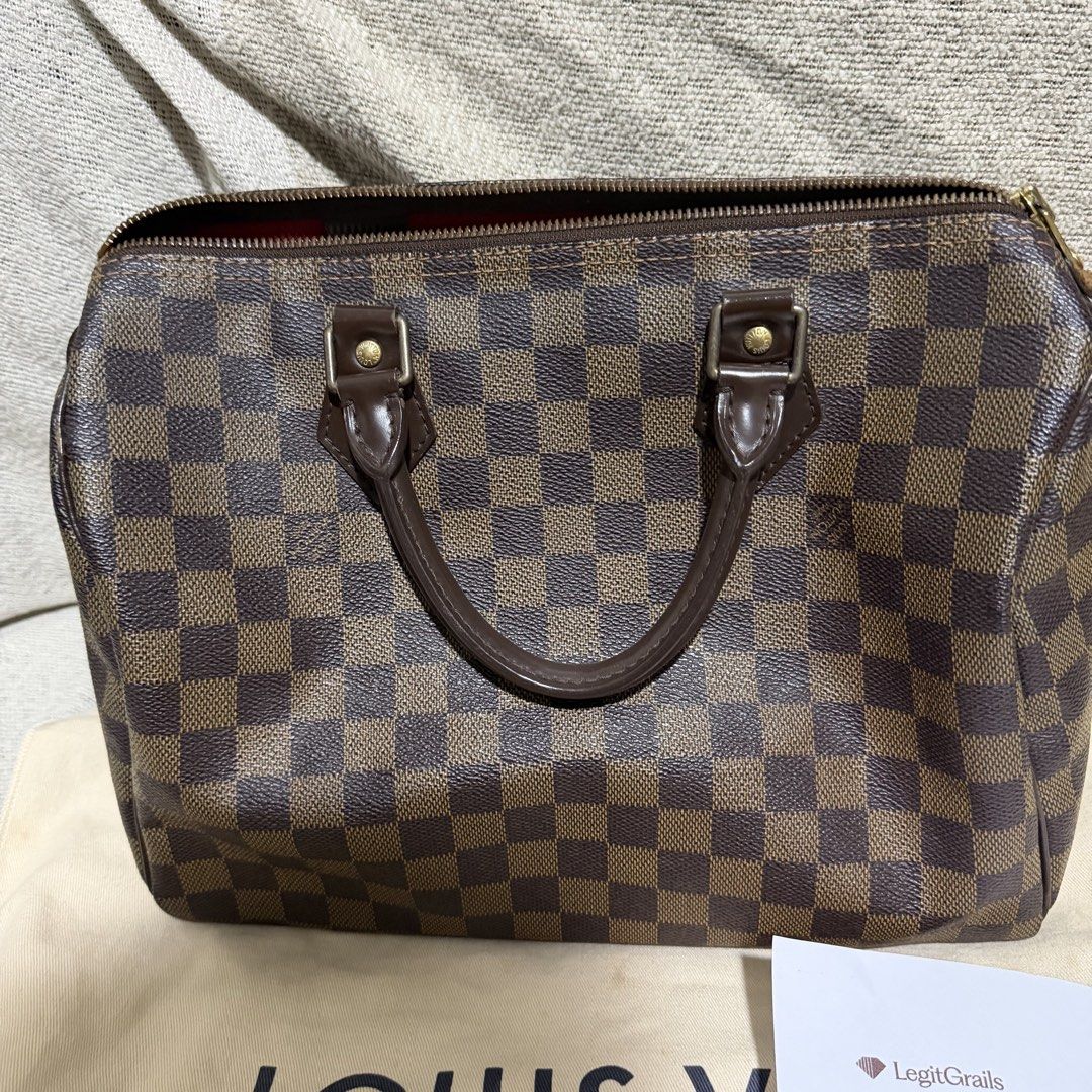 Louis Vuitton Speedy 30 Damier Ebene (Category: Luxury Bags & Wallets) located in Dasmarinas. Submitted by cosmic.miggy (Listing ID 1468443235, Image 2). Description: 📌 Item Details: Brand: Louis Vuitton Model: Speedy 30 Pattern / Material: Damier Ebene Coated Canvas with Dark Brown Leather Trim Hardware: Brass / Gold-tone Interior: Red Canvas Lining Date Code: DU1048 (Made in France - 14th week of 2008) 📦 Inclusions: Original Louis Vuitton Dus