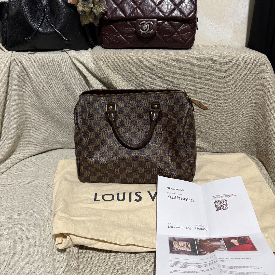 Louis Vuitton Speedy 30 Damier Ebene (Category: Luxury Bags & Wallets) located in Dasmarinas. Submitted by cosmic.miggy (Listing ID 1468443235, Image 1). Description: 📌 Item Details: Brand: Louis Vuitton Model: Speedy 30 Pattern / Material: Damier Ebene Coated Canvas with Dark Brown Leather Trim Hardware: Brass / Gold-tone Interior: Red Canvas Lining Date Code: DU1048 (Made in France - 14th week of 2008) 📦 Inclusions: Original Louis Vuitton Dus