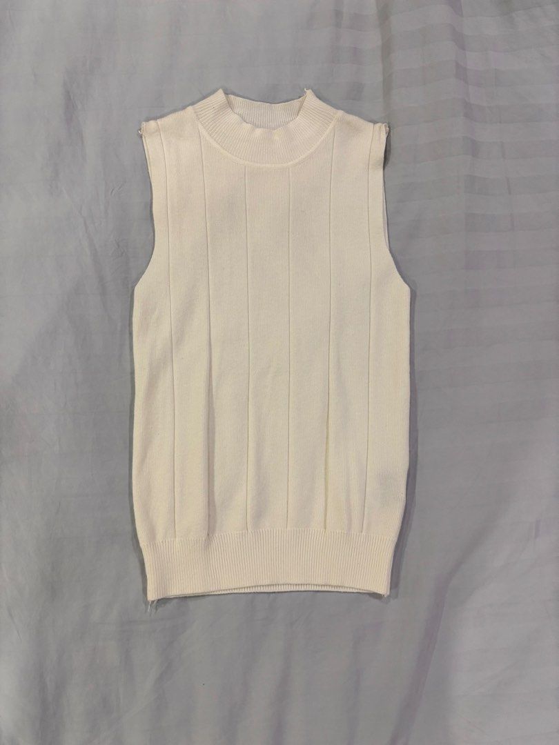 Lovito White Ribbed Knit Tank Top (Category: Sleeveless) located in Manila. Submitted by secondcycle.ph (Listing ID 1468428562, Image 1). Description: - Brand: Lovito - Color: White - Style: Sleeveless ribbed top knitted - Fit: One size (soft and stretchy fabric with a thicker ribbed hem) - brand new never used - Versatility: Great for layering or wearing on its own with jeans or skirts rfs: bought a few years ago and never reached for it, declut