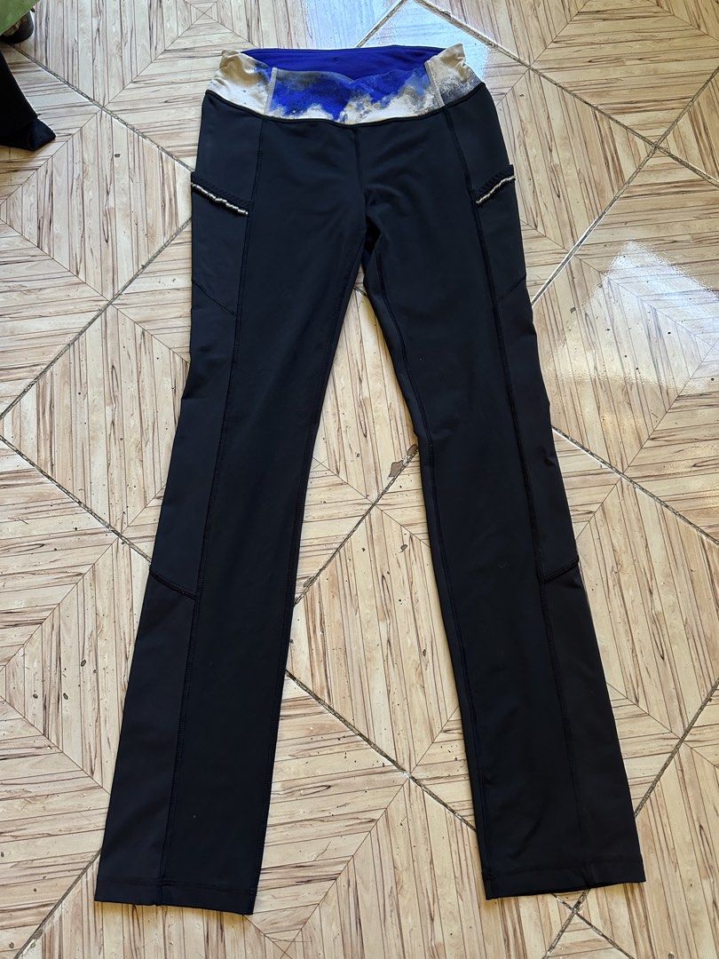 Lululemon Black Athletic Pants Leggings Size 6 (Category: Activewear) located in Angeles City. Submitted by alejeong27 (Listing ID 1468336213, Image 1). Description: - Brand: Lululemon - Size: 6 - Color: Black with blue and white patterned waistband - Pockets: Convenient side pockets and a secure zippered back pocket - Safety: Reflective details on the side seams for low-light visibility - Details: Signature silver Lululemon logo stamped on the l
