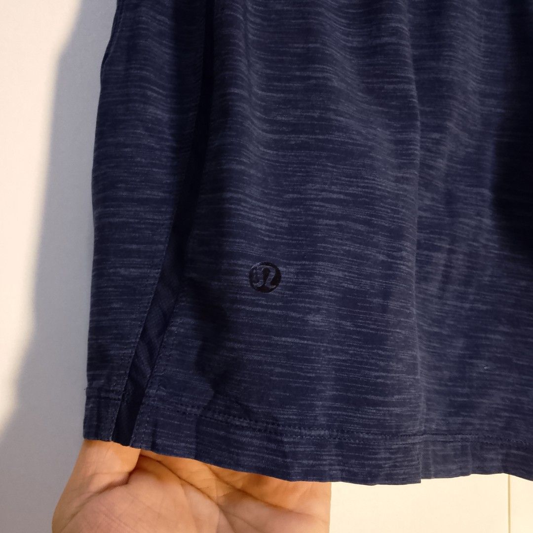Lululemon Blue Heathered Athletic Shorts Size M (Category: Shorts) located in Manila. Submitted by moisky18 (Listing ID 1468455220, Image 3). Description: - Brand: Lululemon - Size: M (printed waistband tag) - Color/Pattern: Dark Blue Heathered Texture - Features: Secure side zip pocket for keys/cards, lightweight stretch fabric - Branding: Iconic Lululemon logo near bottom hem and back - Condition: Excellent - Ideal for: Running, workouts, or ca
