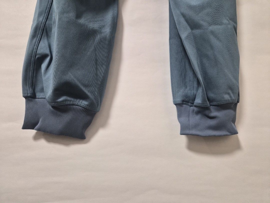 Lululemon Blue Joggers Pants Size 6 (Category: Activewear) located in Manila. Submitted by prelovedbyc.hannah (Listing ID 1468440495, Image 3). Description: - Brand: Lululemon - Color: Blue - Size: 6 - Material: Body is 70% polyester and 30% elastane; inner waistband is 81% nylon and 19% lycra elastane - Features: Elastic waistband with drawstring closure and ribbed ankle cuffs - Condition: Great for workouts or casual lounging at home.