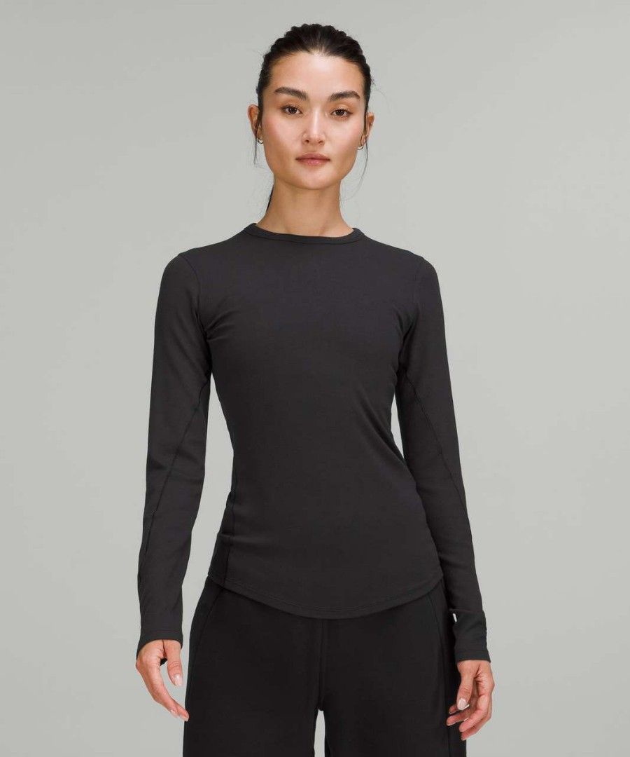 Lululemon Hold Tight Long Sleeve (Category: Longsleeves) located in Manila. Submitted by icamalicdem29 (Listing ID 1468302611, Image 1). Description: Based on the structural details in the image—specifically the distinct contoured side panel stitching, the soft ribbed knit crew neck, and the signature elongated cuffs with built-in thumbholes the item shown appears to be the Lululemon Hold Tight Long Sleeve Shirt.