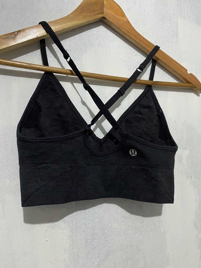 Lululemon Sports Bra (Category: Activewear) located in Bulacan. Submitted by _myarchive (Listing ID 1468406794, Image 2). Description: - Brand: Lululemon -xs-s - Style: V-neck with stylish cross-back adjustable straps - Band: Ribbed underband for a secure and comfortable fit - Material: Seamless, ultra-stretchy fabric - Details: Subtle Lululemon logo on the back - Condition: Excellent, perfect for workouts or everyday lounging.