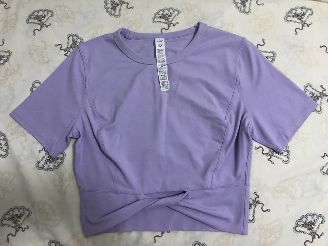 Lululemon Top (Category: Activewear) located in Manila. Submitted by freshlemon58885 (Listing ID 1468412488, Image 1). Description: Dot 8 Can pass as Brand New Purple Rubberized Logo .