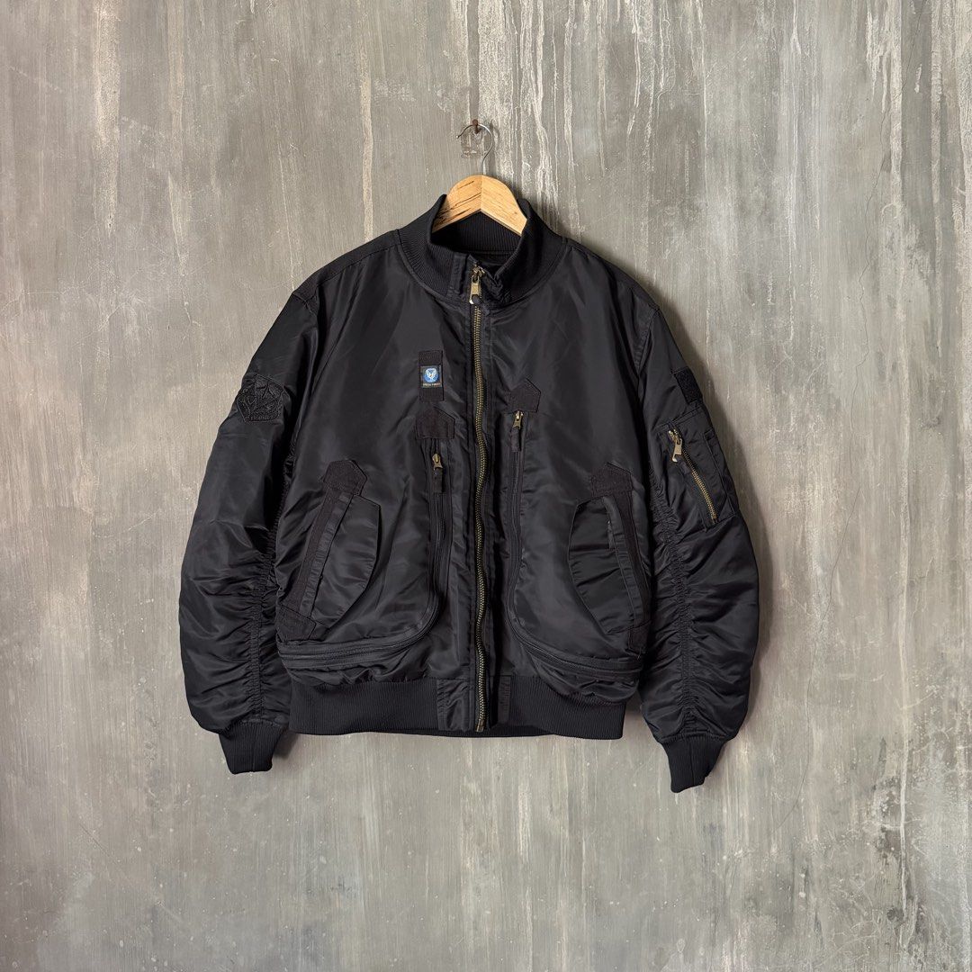 MA-1 Military Bomber Black Jacket (Category: Coats, Jackets and Outerwear) located in Puerto Princesa. Submitted by terdsthrift (Listing ID 1468460232, Image 1). Description: MA-1 Military Black Bomber Jacket Size: Medium Width: 23 Length: 24 Shoulder: 19.5 In Excellent Condition / No Issue Color Rate: 10/10 - Color: Black - Size: M (170/88A) - Design: Tactical bomber style with front zipper closure - Details: Special Forces embroidered patch on 