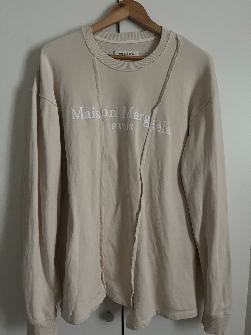 Maison margiela mainline deconstructed crew neck sweater (Category: Coats, Jackets and Outerwear) located in Manila. Submitted by luv4fashion (Listing ID 1468299700, Image 1). Description: Maison margiela beige sweatshirt in perfect condition .