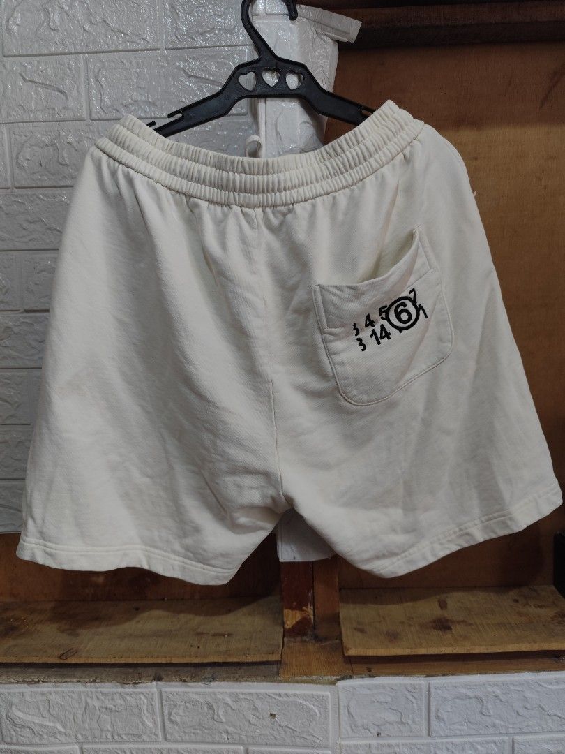 Maison Margiela sweatshort (Category: Shorts) located in Kabacan. Submitted by thriftpingts (Listing ID 1468315206, Image 2). Description: Maison Margiela embroidery Condition: 10/10 Color rate : 10/10 Waist: 30-34 Length: 20 Hem: 12 Washtags: ✅ Issue: need wash.