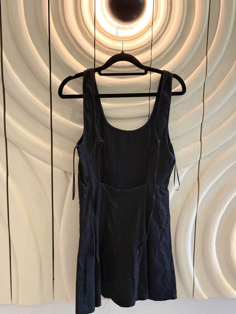 Mango Black Dress Size XS (Category: Dresses) located in Angeles City. Submitted by adeclutters__ (Listing ID 1468341120, Image 2). Description: - Brand: Mango - Color: Black - Size: EUR XS, US 2, MEX ECH - Design: Sleeveless with a scoop neckline and open back - Closure: Back zip - Style: Simple and versatile, easy to dress up or down Some tear inside the clothing but unnoticeable when you wear it..