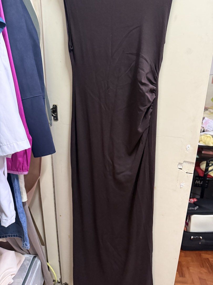 Mango Brown Sleeveless Midi Dress (Category: Dresses) located in Quezon City. Submitted by mikaela_0 (Listing ID 1468356326, Image 3). Description: - Brand: Mango - Style: Sleeveless midi dress with mock neck - Details: Gathered ruching along the side seam - Material: Stretchy fabric, easy to slip on - Size: EUR M / USA 6 / MEX M, fits small to medium - Origin: Made in Turkey - Condition: excellent condition.
