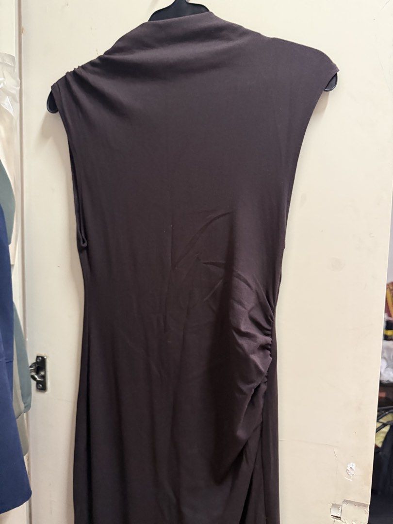 Mango Brown Sleeveless Midi Dress (Category: Dresses) located in Quezon City. Submitted by mikaela_0 (Listing ID 1468356326, Image 2). Description: - Brand: Mango - Style: Sleeveless midi dress with mock neck - Details: Gathered ruching along the side seam - Material: Stretchy fabric, easy to slip on - Size: EUR M / USA 6 / MEX M, fits small to medium - Origin: Made in Turkey - Condition: excellent condition.