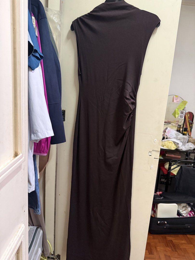 Mango Brown Sleeveless Midi Dress (Category: Dresses) located in Quezon City. Submitted by mikaela_0 (Listing ID 1468356326, Image 1). Description: - Brand: Mango - Style: Sleeveless midi dress with mock neck - Details: Gathered ruching along the side seam - Material: Stretchy fabric, easy to slip on - Size: EUR M / USA 6 / MEX M, fits small to medium - Origin: Made in Turkey - Condition: excellent condition.