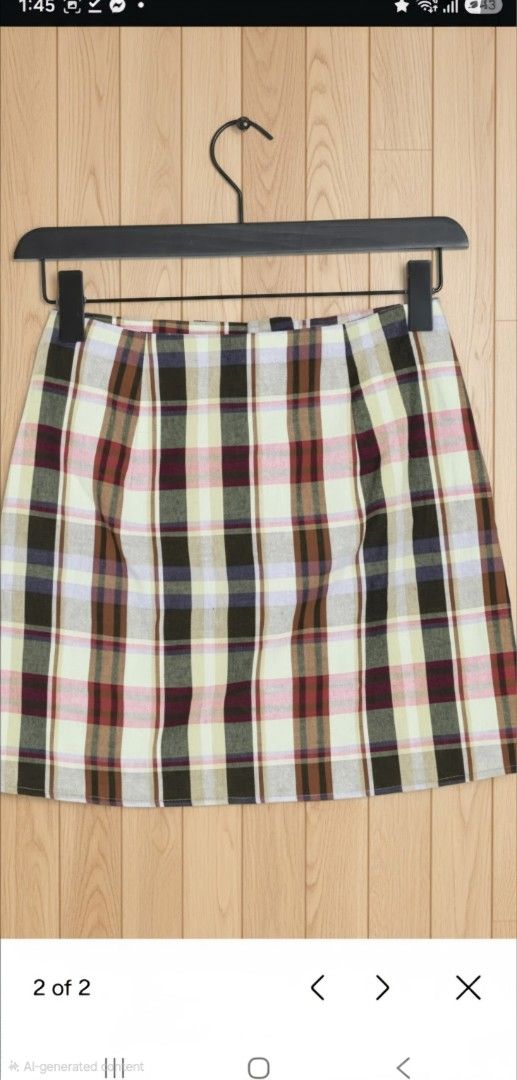 Mango MNG Plaid Mini Skirt (Category: Skirts) located in Quezon City. Submitted by curatedbymissgee (Listing ID 1468326704, Image 2). Description: - Brand: MNG - Style: Plaid mini skirt with button-front closure and front pockets - Pattern: Multicolor check (green, pink, brown, cream) - Details: Fully lined, clean inside and out - Size: EUR M / USA S / MEX M - Condition: Excellent, ready to wear - Great wardrobe staple for mixing and matching; gr