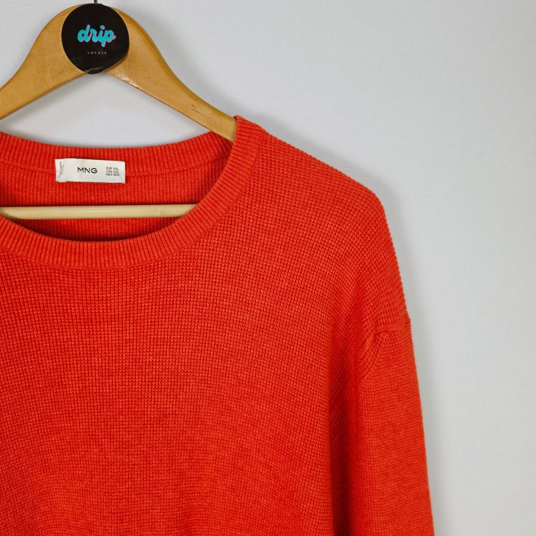 Mango Orange Knitted Sweatshirt (Category: Coats, Jackets and Outerwear) located in Pasig City. Submitted by driplocale (Listing ID 1468313590, Image 2). Description: Mango Orange Knitted Sweatshirt Condition 9.5/10 (Pristine Condition✨) Size: 2XL Chest Width: 25inches Shoulder Width: 22inches Length (Shoulder to Hem): 30inches.