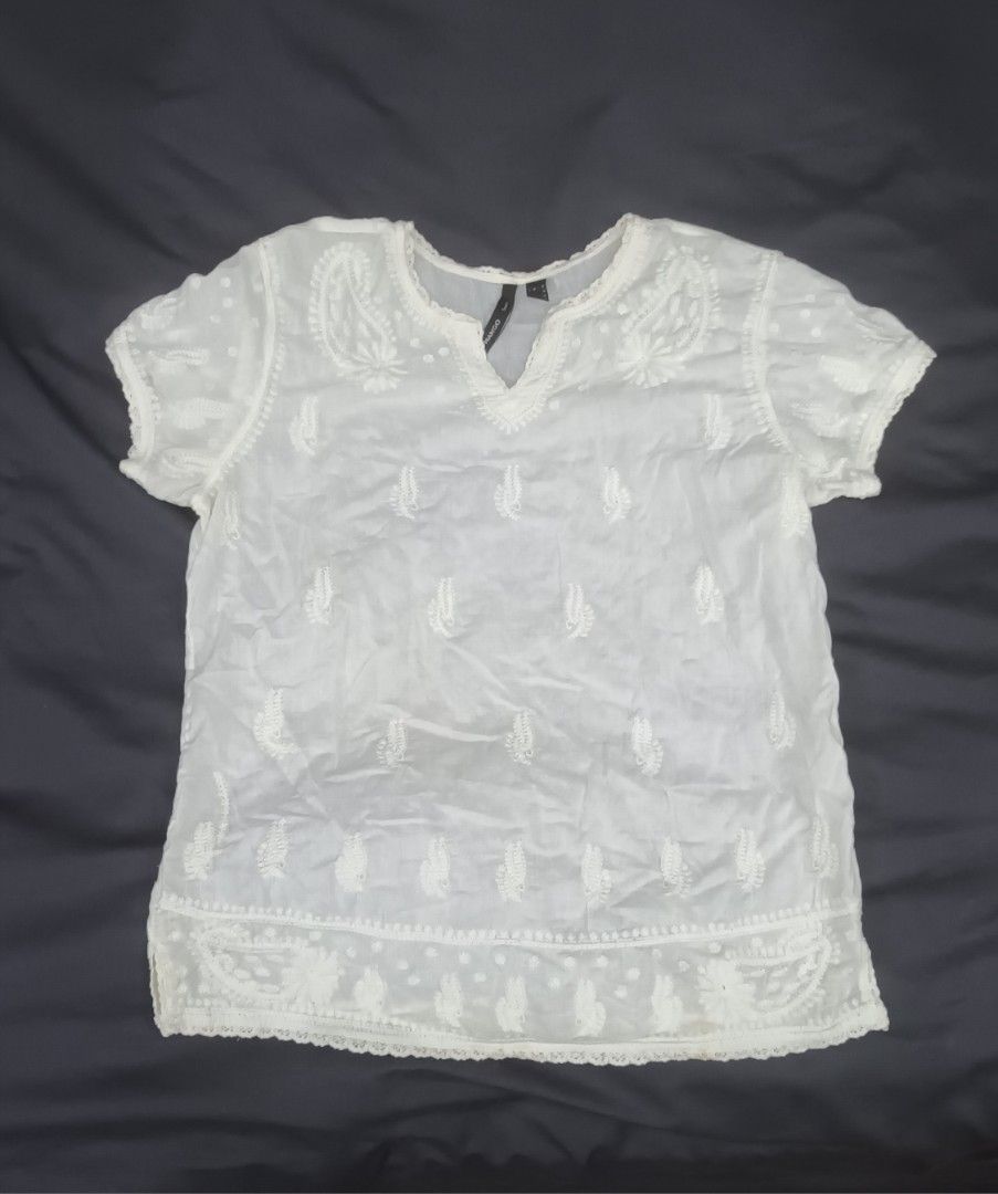 Mango White Embroidered Blouse (Category: Blouses) located in Mandaluyong City. Submitted by bestill4610 (Listing ID 1468406748, Image 1). Description: Mango white embroidered cotton top Pretty details Never used W 20" x L 24".