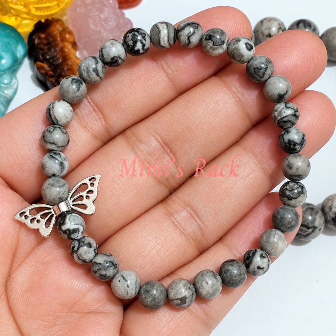 Map Jasper Stone Bracelet with Silver Butterfly Charm (Category: Bracelets) located in Taguig. Submitted by mimisrack (Listing ID 1468323291, Image 2). Description: 🩶A beautiful matching bracelet duo featuring map jasper beads in a unique mix of gray, black, and creamy white patterns. Each bead has its own distinctive markings, resembling miniature maps and natural landscapes. Finished with elegant silver-tone butterfly charms, these bracelets a