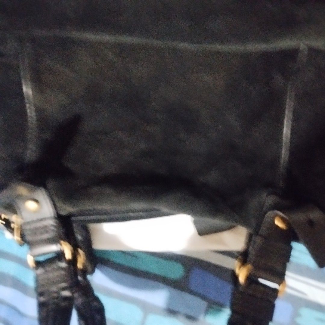 Marc by Marc Jacobs black suede shoulder bag (Category: Cross-body Bags) located in Manila. Submitted by lene48 (Listing ID 1468498636, Image 3). Description: - Brand: Marc by Marc Jacobs - Material: Soft black suede with leather trim and contrast stitching - Hardware: Gold-tone turn-lock front pocket and engraved zippers - Straps: Double leather shoulder straps with ring attachments - Interior: Spacious main compartment for your daily essentials