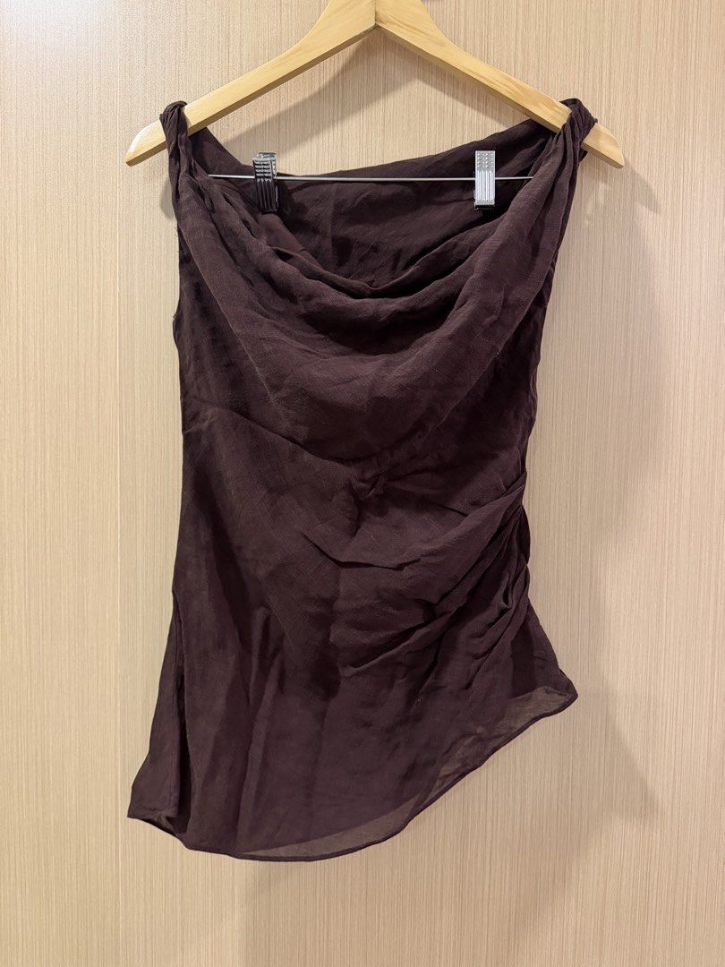 Massimo Dutti Brown Asymmetrical Cowl Neck Top (Category: Sleeveless) located in Makati City. Submitted by lovedbyalexis_ (Listing ID 1468417755, Image 2). Description: - Brand: Massimo Dutti - Size: Small - Color: Rich dark brown - Design: One-shoulder with asymmetrical neckline and draped cowl - Fit: Relaxed with stylish side ruching - Fabric: Linen Blend, Lightweight and comfortable - Versatility: Perfect for both casual wear with denim or dre