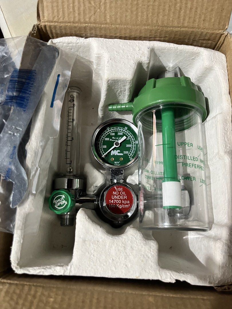 MC Oxygen Regulator YR-86 with Humidifier Bottle (Category: Medical Supplies & Tools) located in Pasig City. Submitted by emsans (Listing ID 1468387292, Image 2). Description: - Brand: MC Oxygen Regulator (Model YR-86) - Distributor: Medical Center Trading Corporation - Condition: Box opened for photos only, 100% unused in original molded packaging - Inclusions: - Flow meter - Pressure gauge - Humidifier bottle - Spanner - FREE nasal cannula.