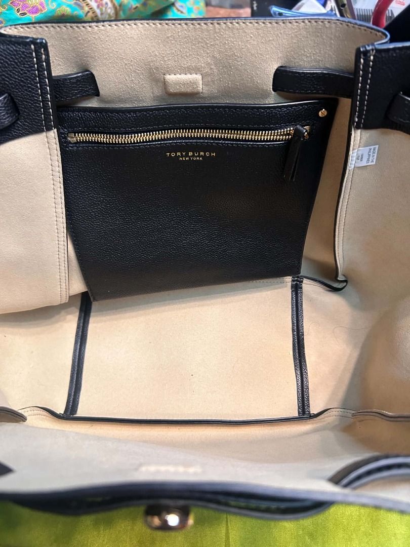 McGraw Bucket Tote (Category: Luxury Bags & Wallets) located in Quezon City. Submitted by abk_storemandaluyong25 (Listing ID 1468456666, Image 2). Description: Product Details • Brand: Tory Burch • Model: McGraw Drawstring Tote / Bucket Tote • Colorway: Black with Gold-Tone Hardware • Materials: Premium pebbled leather upper, unlined or tonal micro-suede interior, and flat leather shoulder straps. • Design Features: A beautifully relaxed, slouchy