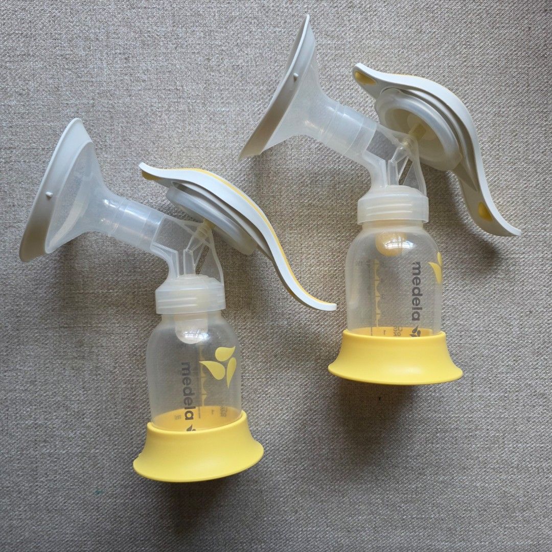 Medela Harmony Manual Breast Pump Set (Category: Breastfeeding & Bottle Feeding) located in Manila. Submitted by moccayap23686 (Listing ID 1468321080, Image 2). Description: - Authentic Medela Harmony manual breast pump - Includes 2 pump handles, connectors, and stands - Comes with 24mm breast shields and bottles with yellow bases - Ideal portable option and great backup set for travel - Clean, fully assembled, and easy to disassemble for washing