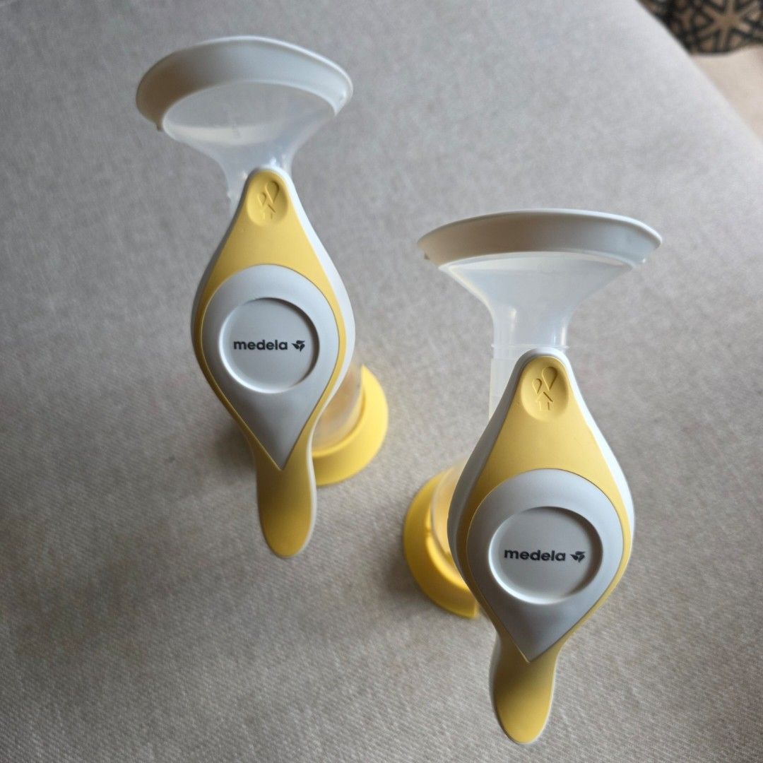 Medela Harmony Manual Breast Pump Set (Category: Breastfeeding & Bottle Feeding) located in Manila. Submitted by moccayap23686 (Listing ID 1468321080, Image 3). Description: - Authentic Medela Harmony manual breast pump - Includes 2 pump handles, connectors, and stands - Comes with 24mm breast shields and bottles with yellow bases - Ideal portable option and great backup set for travel - Clean, fully assembled, and easy to disassemble for washing