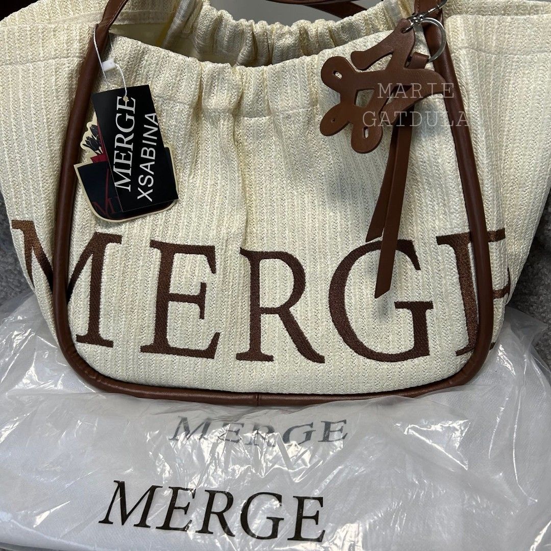 Merge Bag (Category: Tote Bags) located in Pasig City. Submitted by thrifthoeco. (Listing ID 1468398245, Image 1). Description: 🪩 Credits to the owner of the pic. Actual bag is not with me atm but super same bag! 🪩 RFS: Massive decluttering. Napapagalitan na ng asawa HAHAHA Merge Tote Bag - Brand new, unused, just stored. Complete with all the plastic, dust bag and tags are still intact. - From Thailand - Free sf via J&T only. If lalamove, i ca