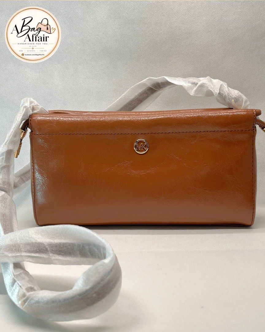 Michael Kors Matilda Small Cinched Crossbody (Category: Luxury Bags & Wallets) located in Caloocan City. Submitted by authenticbags2026 (Listing ID 1468298160, Image 1). Description: Michael Kors Matilda Small Cinched Crossbody Color: Luggage US-SOURCED 🇺🇸 | AVAILABLE ON HAND — NO WAITING, READY TO SHIP 📦 ✨ Brand New ✨ Authentic Michael Kors item ✨ Cinched crossbody silhouette ✨ Gold-tone hardware ✨ Adjustable/detachable strap ✨ Interior back 