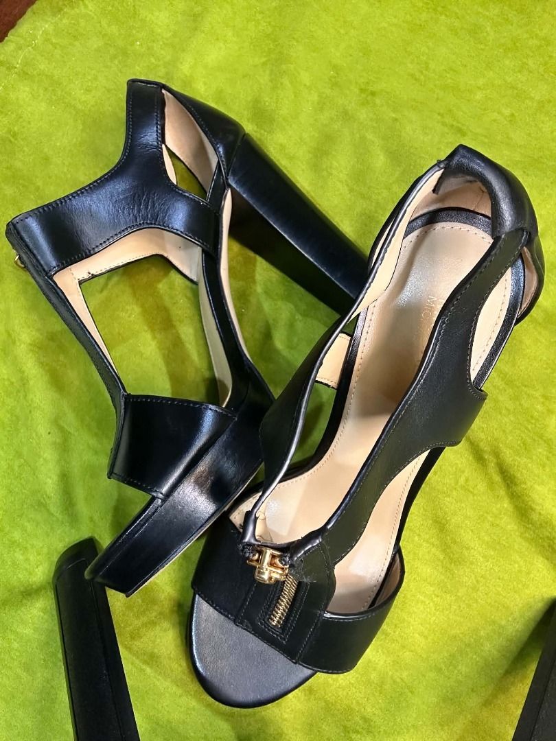 MICHAEL Michael Kors Berkley Platform T-Strap Sandal (Category: Sneakers & Footwear) located in Quezon City. Submitted by abk_storemandaluyong25 (Listing ID 1468448711, Image 1). Description: Product Details • Brand: MICHAEL Michael Kors • Model: Berkley T-Strap Platform Sandal (or Berkley High Heel Sandal) • Materials: Genuine leather upper, synthetic lining, sturdy block heel, and rubber outsole. • Design Features: A sporty yet dressy architect