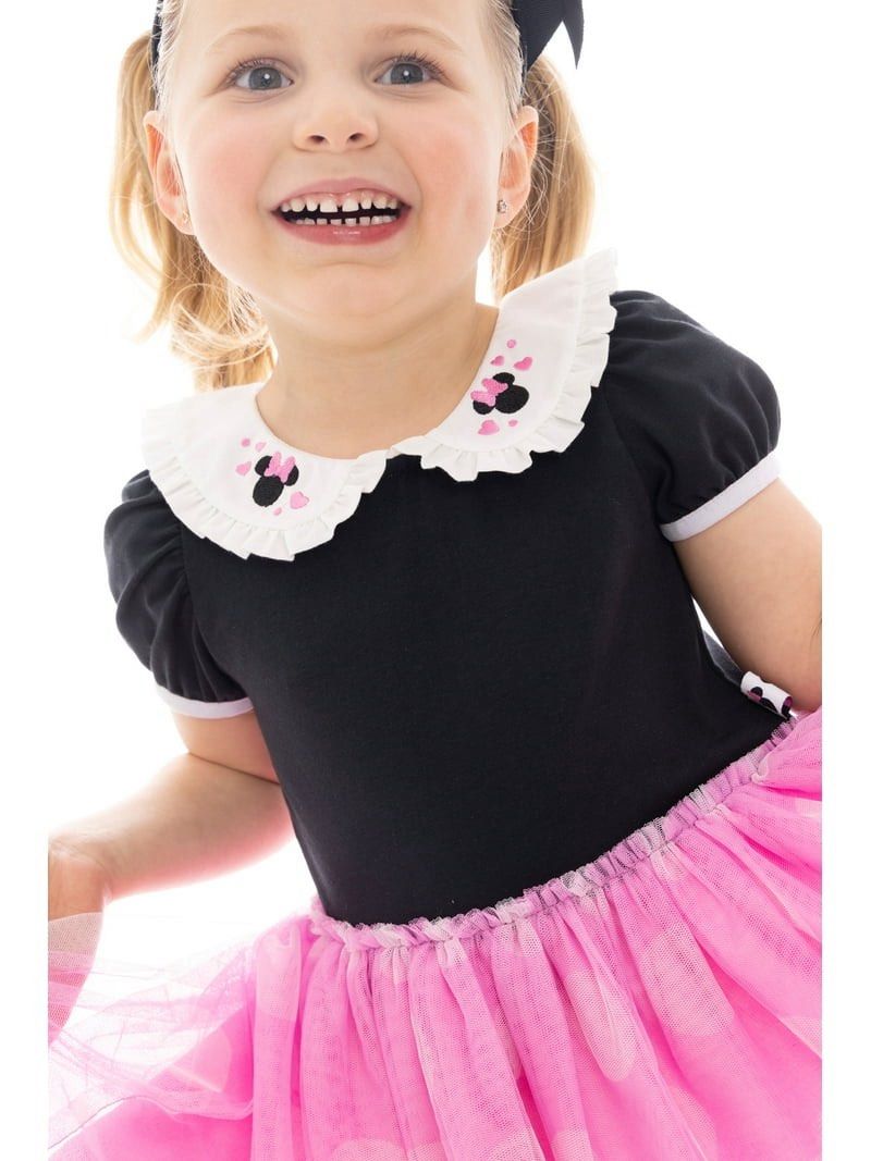 Minnie Mouse Tutu Dress (Category: Babies & Kids Fashion) located in Quezon City. Submitted by prettydollph (Listing ID 1468325095, Image 3). Description: - Product: Minnie Mouse Tutu Dress - Target Age: 1-3 years old (Baby & Kids Fashion) - Design: Black short-sleeve top with white ruffled collar featuring Minnie Mouse & heart embroidery, paired with a fluffy pink polka-dot tulle skirt - Condition: Brand new - Perfect for: Birthday parties, pict