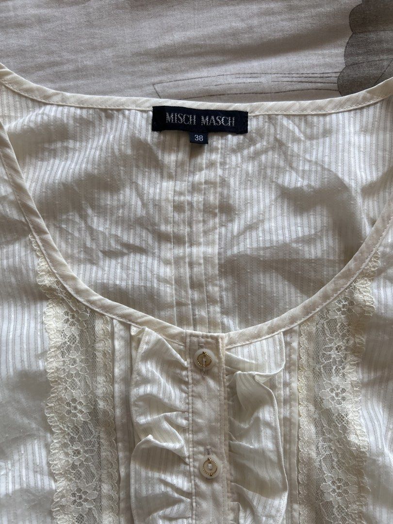 Misch Masch Coquette Y2k cream top (Category: Blouses) located in Makati City. Submitted by lilylovesxo (Listing ID 1468382706, Image 2). Description: Best fits medium frames No when worn‼️ Waistline: 29-30” Bust: 32-24” .