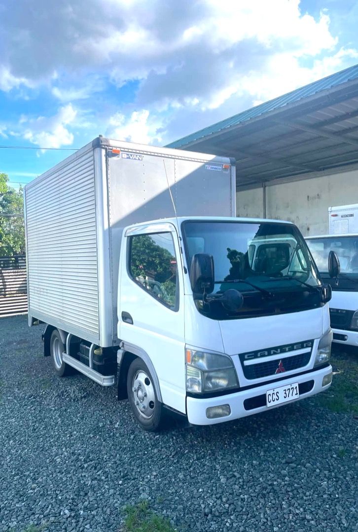 Mitsubishi Fuso Canter (M) (Category: New Cars) located in Caloocan City. Submitted by rushtrono (Listing ID 1468320099, Image 2). Description: For Sale‼️ FUSO CANTER ALUMINUM / CLOSED VAN 10ft NKR with Side Door ✔️ 4m51 engine ✔️ Manual Transmission ✔️ 10ft NKR body ✔️ with Side Door ✔️ Aircon Ready to reconnect ✔️ Newly Acquired, Japan Surplus ✅ 680k negotiable ✅ 0995 876 9343 Fairview Quezon City.