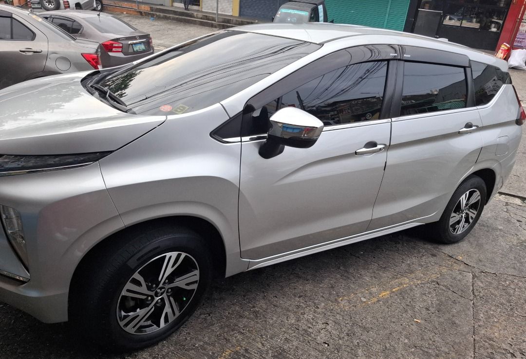 Mitsubishi Xpander GLS Auto (Category: Used Cars) located in Muntinlupa City. Submitted by dabenzstar (Listing ID 1468340395, Image 3). Description: 🚘 For Sale! 2021 Mitsubishi Xpander GLS – Sterling Silver Metallic 🛠️ Well-maintained, Regular Preventive Maintenance 🔑 Key Features & Upgrades • ✅ Dark 3M Tint, Rain Visor, Deep Dish Matting and Dashboard Cover • ✅ Leather Seats (removable if preferred) • ✅ ETACS Auto-lock & Speed Sensor (activat