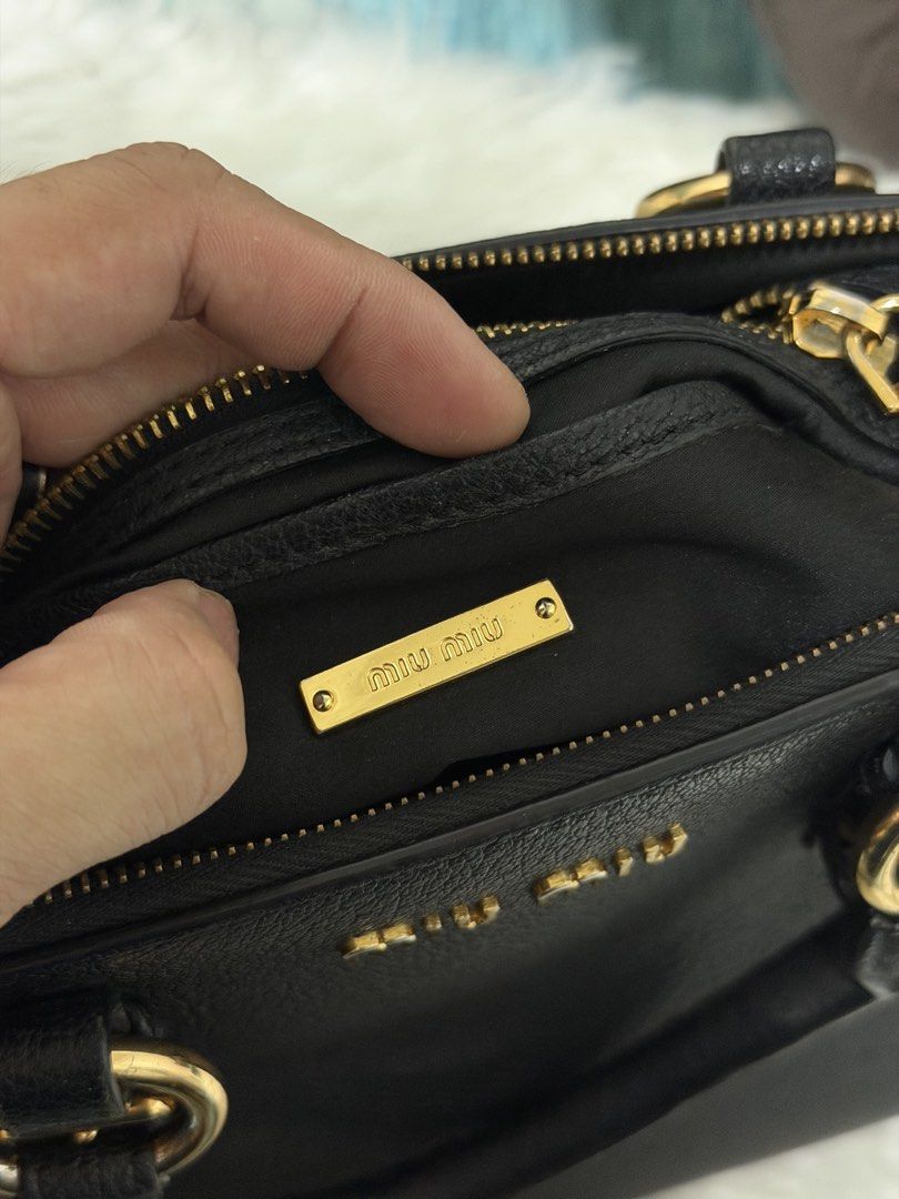 MIU MIU 2 WAY BAG (Category: Luxury Bags & Wallets) located in Paranaque City. Submitted by glendalecollection (Listing ID 1468400452, Image 2). Description: 2 way Miu Miu Bag Black Color Good condition Rank AB.