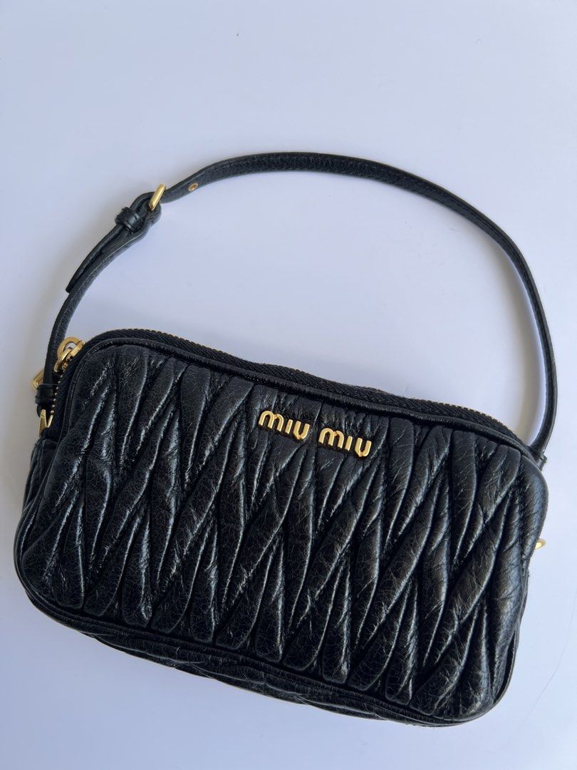 MIU MIU - MATELASŠE LEATHER MINI POCHETTE BAG (Category: Luxury Bags & Wallets) located in Cavite. Submitted by _Gizmo (Listing ID 1468372485, Image 2). Description: Miu Miu - Matellassé Leather Mini Pochette Bag Wrist strap can be worn multiple ways, as a wristlet, as a handle, or around a bigger purse as a cute bag charm. Measurement Width: 6’ Inch Height: 3.5’ Inch Depth: 1.5’ Inch Sling drop: 4.5’ Inch Condition: Rank A No flaws Made In Turke