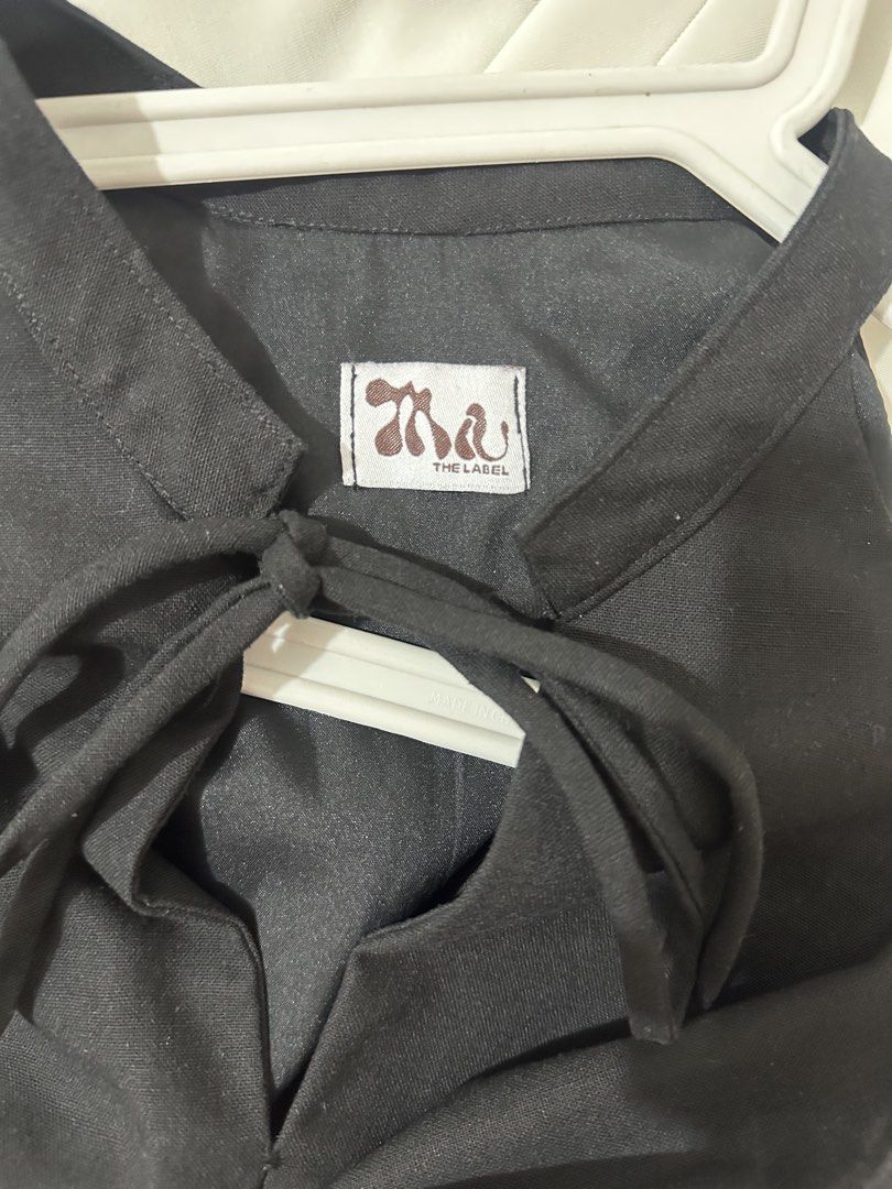 Miu the Label Sol Top (Category: Blouses) located in Manila. Submitted by jean_closet (Listing ID 1468403704, Image 3). Description: Size medium Black Worn twice Last price on all items. Discount may be considered if buying more than 1 item. .