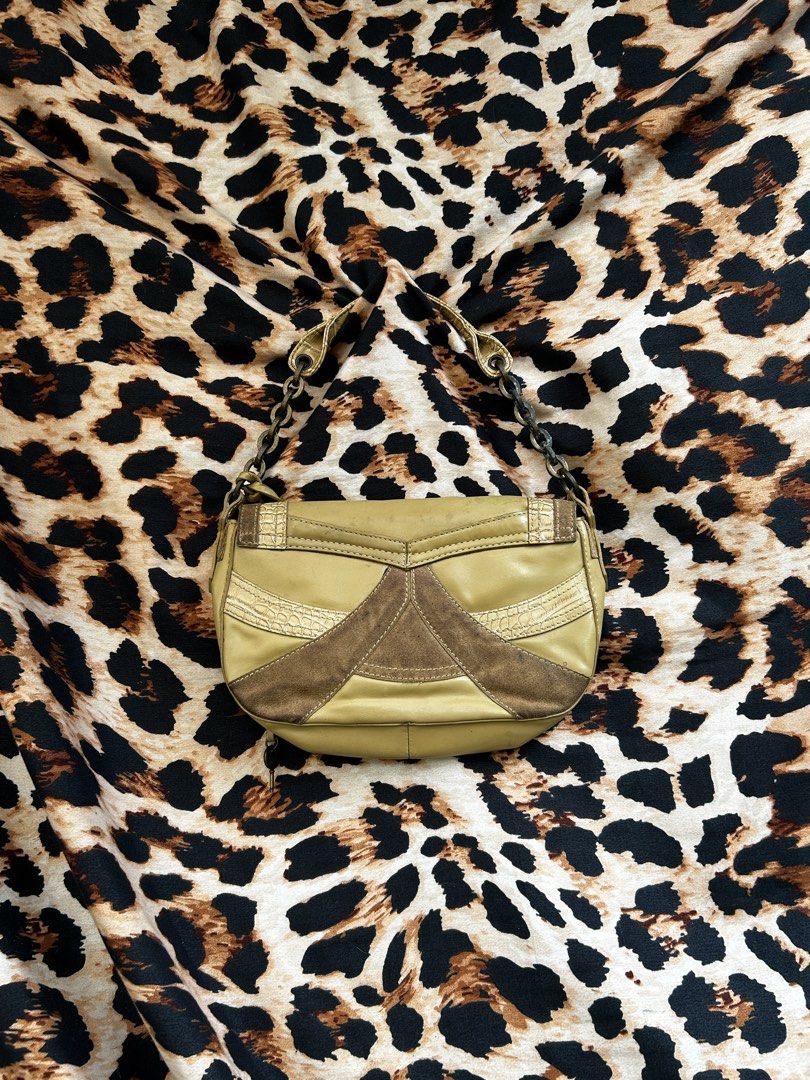 MNG khaki brown shoulder bag with chain strap (Category: Shoulder Bags) located in Los Banos. Submitted by samsukehiro (Listing ID 1468380808, Image 2). Description: - Brand: MNG - Color: Khaki brown - Material/Texture: Mixed textures with smooth leather, suede patches, and embossed croc detailing - Hardware & Accents: Antique brass-tone front lock with MNG stamp and a charming hanging heart charm - Strap: Combination chain and leather strap - De