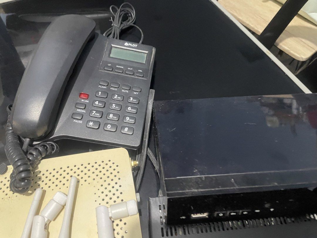 Modem Router (Category: Computer Parts) located in Binan City. Submitted by winds06 (Listing ID 1468322149, Image 3). Description: Take all. Digi Box Cignal receiver, PLDT handset, PlDT Modem Router. Actually 3 ang cignal box receiver..