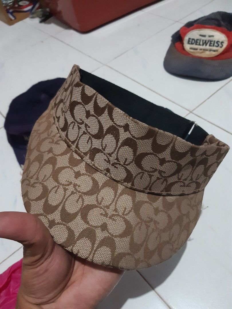 Monogram Pattern Sun Visor Cap Polyester (Category: Cap & Hats) located in Klang. Submitted by silent.ali_jamaludin (Listing ID 1468390993, Image 1). Description: - Stylish brown monogram pattern all over - Adjustable black strap at the back for a custom fit - Material: 100% polyester - Condition note: Some loose threads around the brim edge - Perfect for outdoor days, sunny weather, or casual streetwear -bundle -rm 40 -cod meru klang 0173684540 
