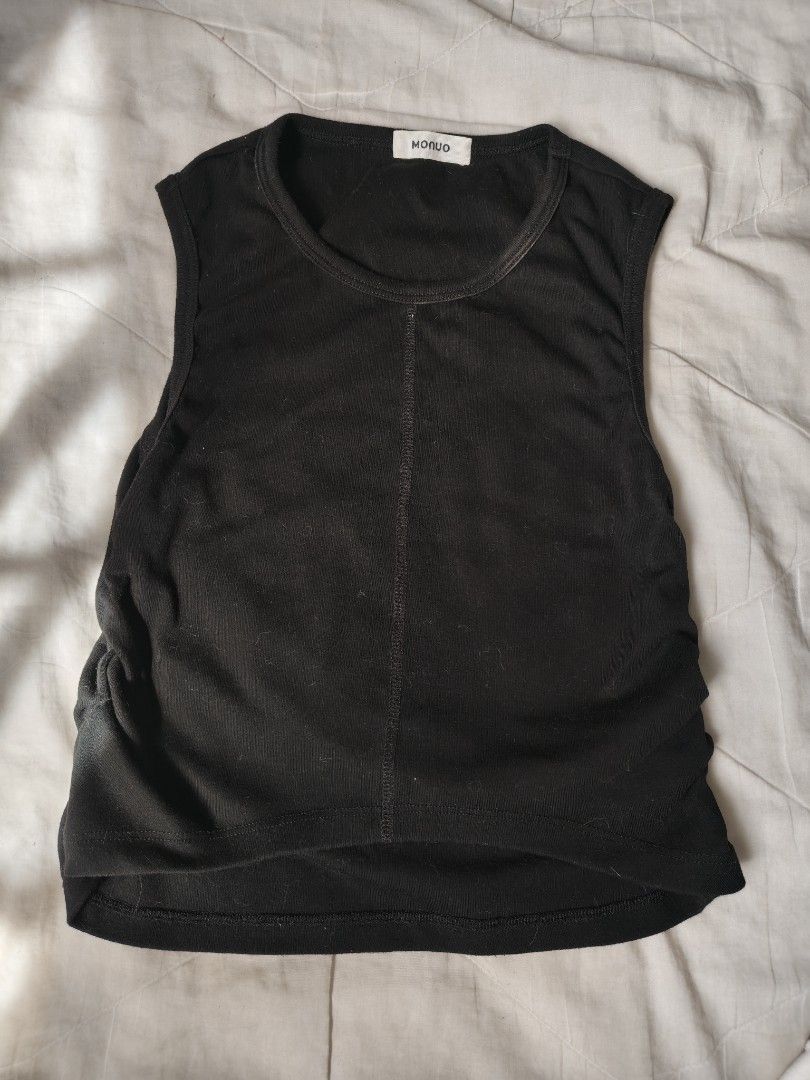 MONUO Black Ribbed Sleeveless Tank Top (Category: Sleeveless) located in Antipolo. Submitted by _suspiria (Listing ID 1468318860, Image 1). Description: - Brand: MONUO - Color: Black - Style: Sleeveless ribbed tank top with scoop neckline and vertical center seam - Details: Chic side ruching and cropped length (approx. 13 inches) - Material: Stretchy cotton blend for all-day comfort - Condition: Great casual basic wardrobe staple.