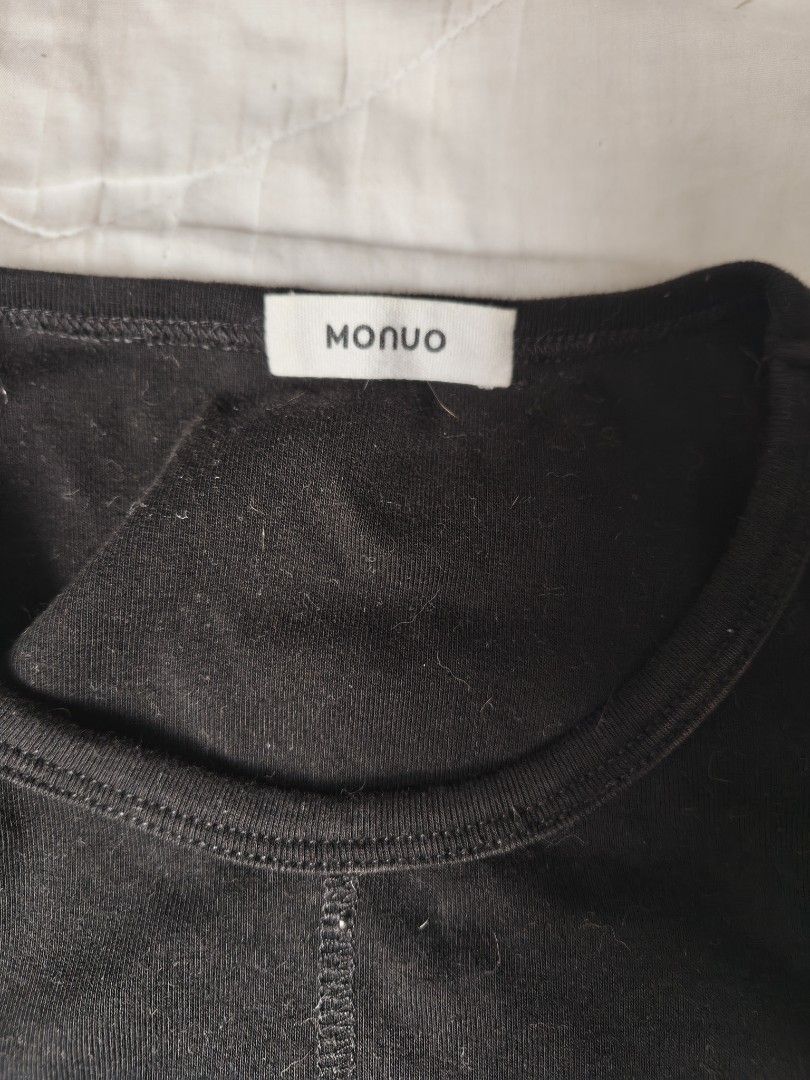 MONUO Black Ribbed Sleeveless Tank Top (Category: Sleeveless) located in Antipolo. Submitted by _suspiria (Listing ID 1468318860, Image 2). Description: - Brand: MONUO - Color: Black - Style: Sleeveless ribbed tank top with scoop neckline and vertical center seam - Details: Chic side ruching and cropped length (approx. 13 inches) - Material: Stretchy cotton blend for all-day comfort - Condition: Great casual basic wardrobe staple.