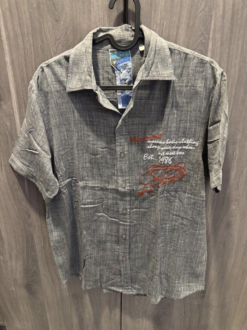 Mossimo Grey Short Sleeve Button Down Shirt (Category: Tshirts & Polo Shirts ) located in Taguig. Submitted by kittychum (Listing ID 1468324338, Image 1). Description: Good as new Regular Fit Size Large.
