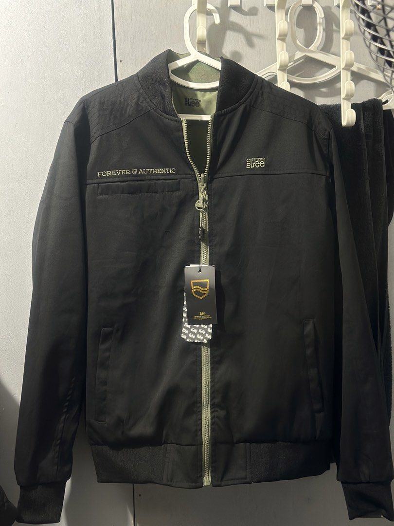 Mr. Lee Reversible Bomber Jacket Black and Fatigue Green (Category: Coats, Jackets and Outerwear) located in Manila. Submitted by cnmanaois19234 (Listing ID 1468385378, Image 1). Description: - Brand: Mr. Lee - Condition: Brand new with tags attached - Style: Reversible bomber jacket with full zip closure and ribbed collar, cuffs, and hem - Side A: Black with 'FOREVER AUTHENTIC' text and logo embroidery - Side B: Solid fatigue green with a zipped