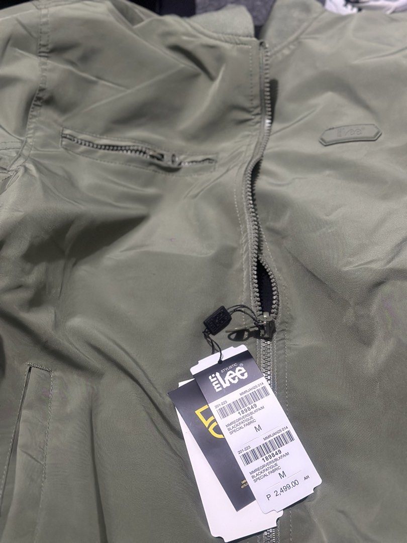 Mr. Lee Reversible Bomber Jacket Black and Fatigue Green (Category: Coats, Jackets and Outerwear) located in Manila. Submitted by cnmanaois19234 (Listing ID 1468385378, Image 3). Description: - Brand: Mr. Lee - Condition: Brand new with tags attached - Style: Reversible bomber jacket with full zip closure and ribbed collar, cuffs, and hem - Side A: Black with 'FOREVER AUTHENTIC' text and logo embroidery - Side B: Solid fatigue green with a zipped