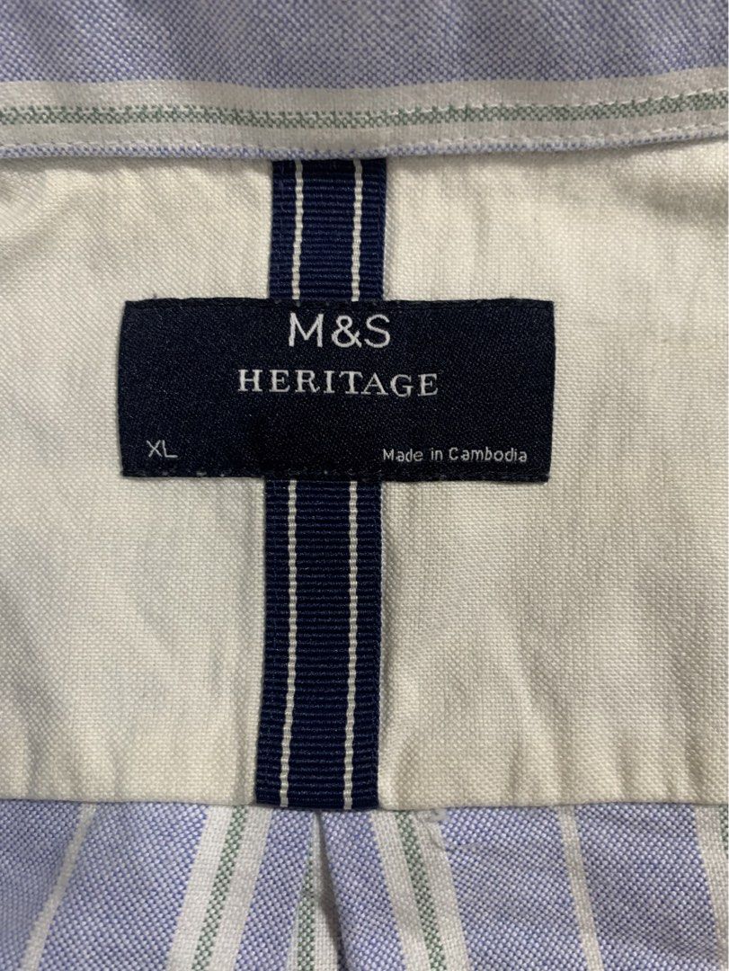 M&S Heritage Blue Striped Button Down Shirt XL (Category: Tshirts & Polo Shirts ) located in Caloocan City. Submitted by ashg_0630 (Listing ID 1468328269, Image 3). Description: 💼 Marks & Spencer Heritage Long-Sleeve Oxford Button-Down - Size XL Price: ₱1,350 (Mall Price: ₱2,800+) Condition: 9.5/10 (Worn once only). Fresh, clean, and prepped. Details & Specs: Brand: Marks & Spencer (M&S Heritage Line) Size: XL (Chest 44–46 inches / Regular Lengt